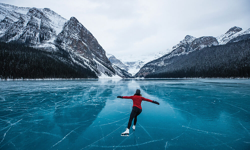 Skater Danielle Gillard skating on Lake Louise Banff National Park